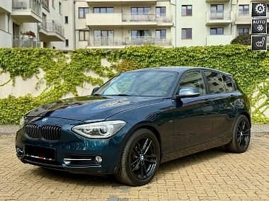 Turkusowy (metalik) Używany 2014 BMW 118 Sport Line Hatchback | 39 500 zł - Obraz 1/4