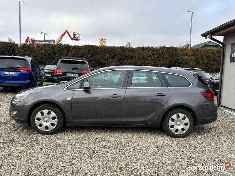 Grafitowy Używany 2011 Opel Astra Kombi | 19 990 zł (Uczciwa cena) - Obraz 1/4