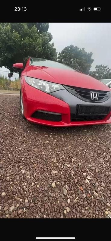 Czerwony (metalik) Używany 2013 Honda Civic Hatchback | 34 900 zł (Dobra cena) - Obraz 1/2
