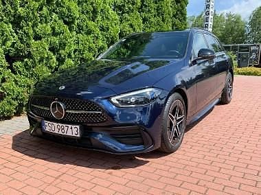 Niebieski Używany 2022 Mercedes C300e Kombi | 179 000 zł - Obraz 1/4