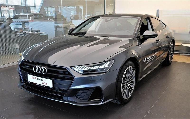 Szary Używany 2022 Audi A7 Ambiente Hatchback | 219 950 zł (Dość drogi) - Obraz 1/4