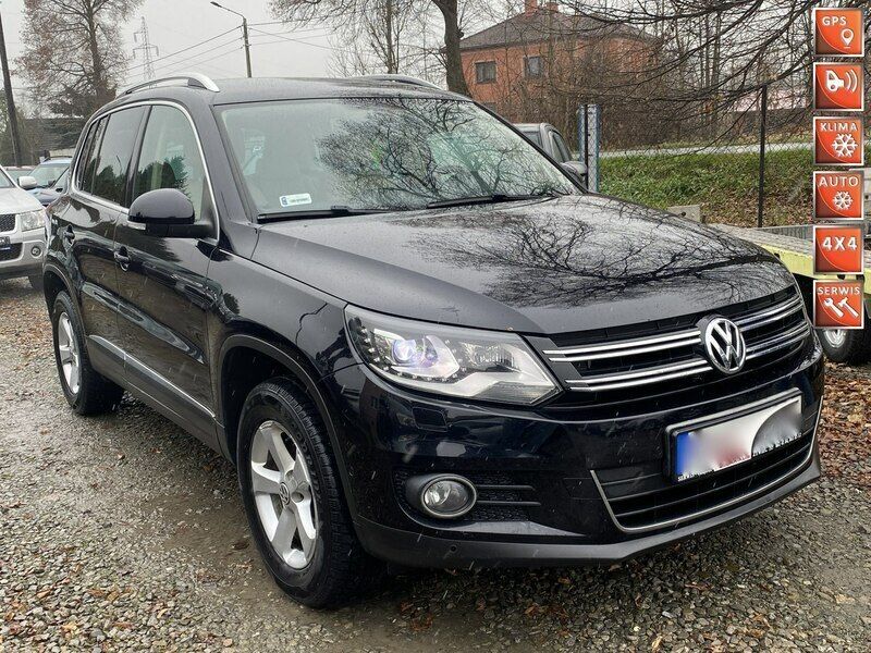 Czarny Używany 2012 VW Tiguan Highline SUV | 53 900 zł (Uczciwa cena) - Obraz 1/4