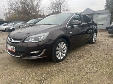 Brązowy Używany 2014 Opel Astra Cosmo Sedan/Limuzyna | 38 900 zł (Dość drogi) - Obraz 1/4