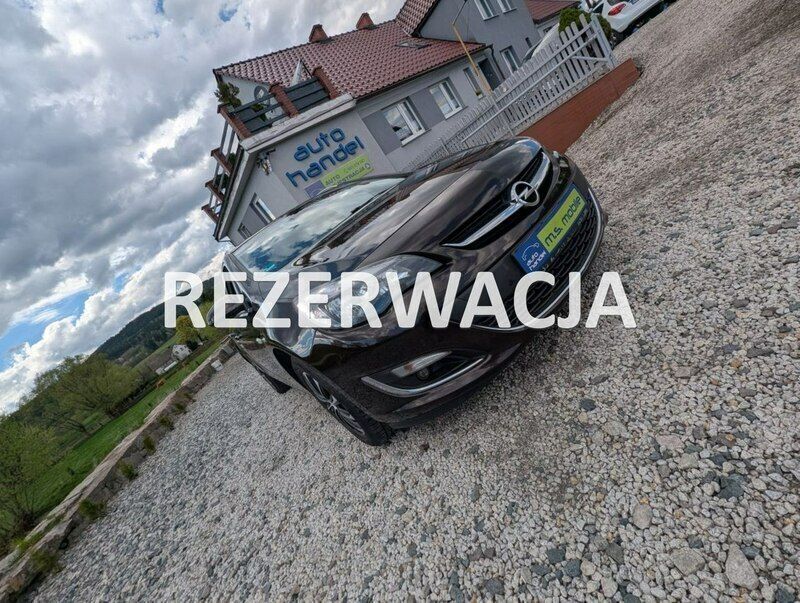 Brązowy (metalik) Używany 2015 Opel Astra Kombi | 21 900 zł (Uczciwa cena) - Obraz 1/4