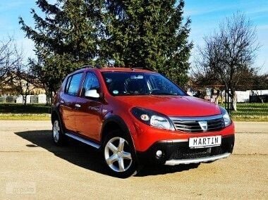 Bordowy Używany 2012 Dacia Sandero Stepway Hatchback | 23 900 zł - Obraz 1/4