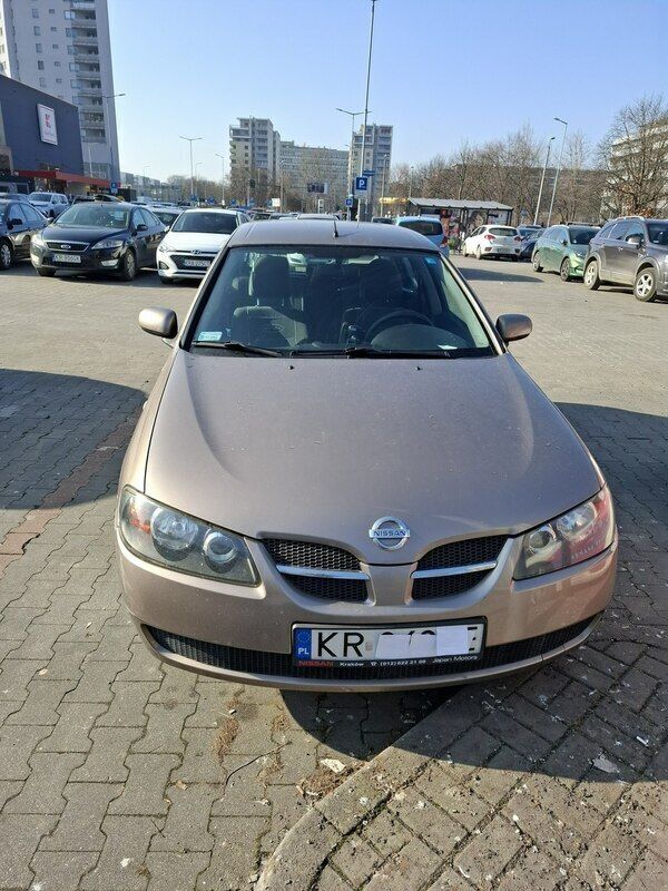 Beżowy (metalik) Używany 2006 Nissan Almera Tino Minivan | 8500 zł - Obraz 1/4