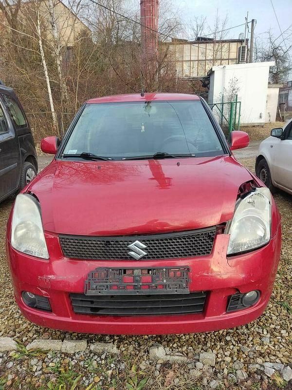 Czerwony Używany 2007 Suzuki Swift Hatchback | 3200 zł - Obraz 1/4