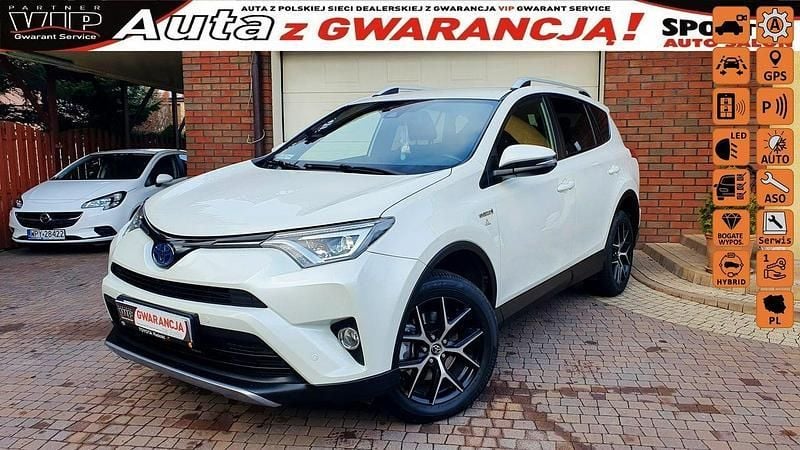 Biały Używany 2016 Toyota RAV4 Hybrid Premium SUV | 86 500 zł (Dość drogi) - Obraz 1/4