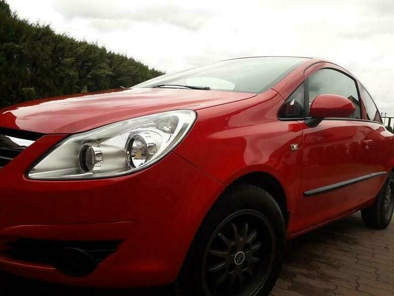 Czerwony Używany 2009 Opel Corsa Hatchback | 12 000 zł (Uczciwa cena) - Obraz 1/4