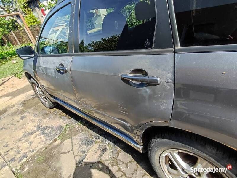 Używany Mitsubishi Outlander Comfort Edition 136 KM (100 kW) 2007 Srebrny SUV