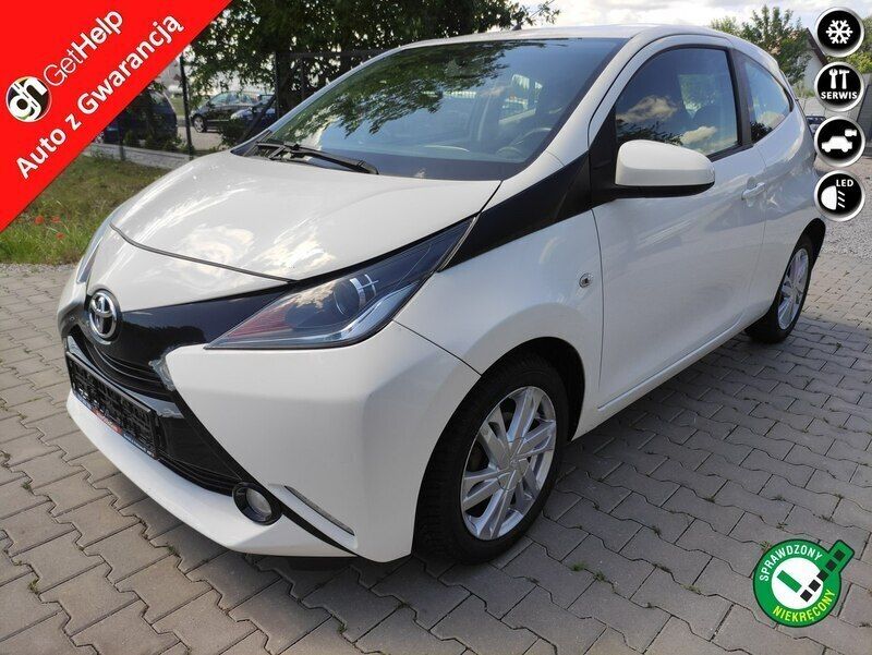 Biały Używany 2015 Toyota Aygo Hatchback | 21 900 zł (Drogi) - Obraz 1/4