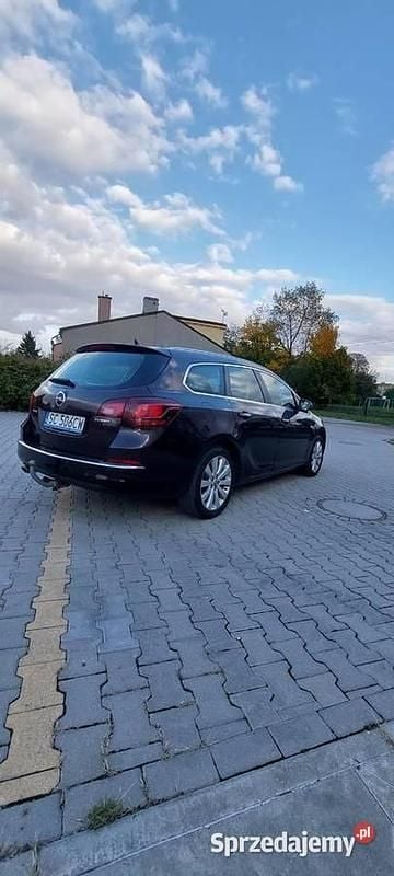 Brązowy Używany 2013 Opel Astra Cosmo Kombi | 34 000 zł (Dość drogi) - Obraz 1/4