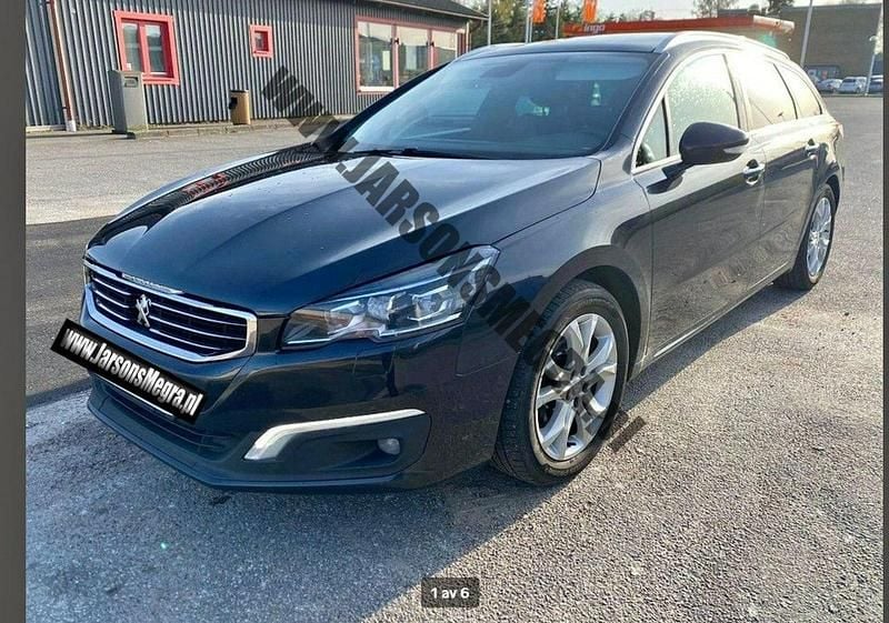 Czarny Używany 2016 Peugeot 508 SW Kombi | 33 250 zł - Obraz 1/4