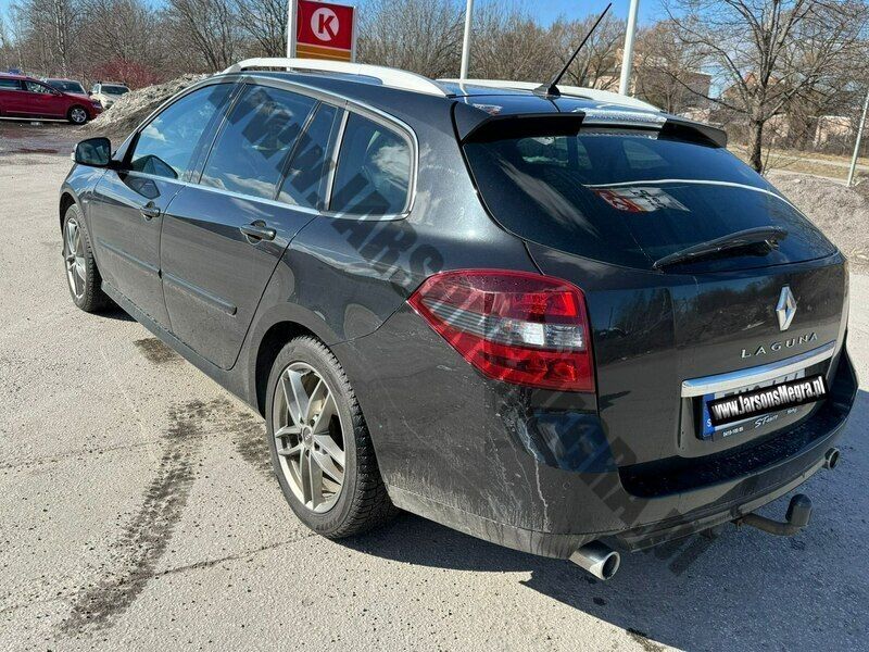 Używany Renault Laguna III 173 KM (127 kW) 2014 Biały Kombi