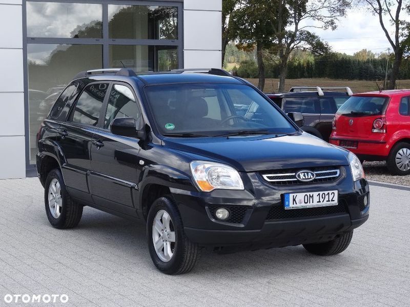 Kia sportage ii рестайлинг