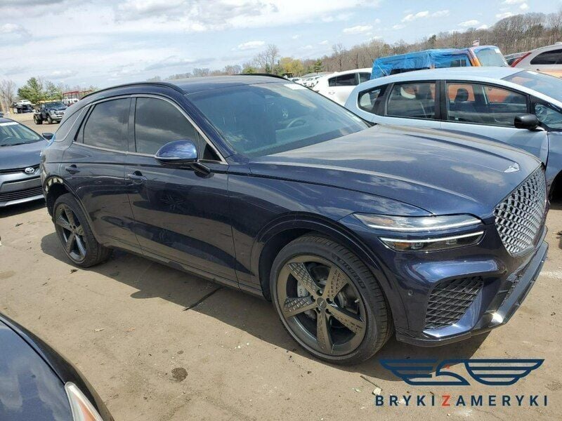 Niebieski ciemny Używany 2024 Genesis GV70 SUV | 122 230 zł - Obraz 1/3