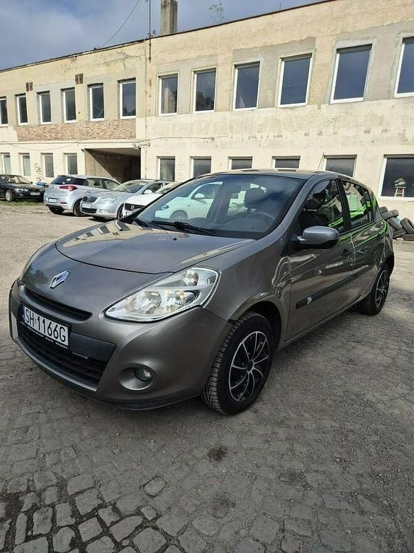 Żółtozłoty Używany 2009 Renault Clio III Hatchback | 12 900 zł (Uczciwa cena) - Obraz 1/4