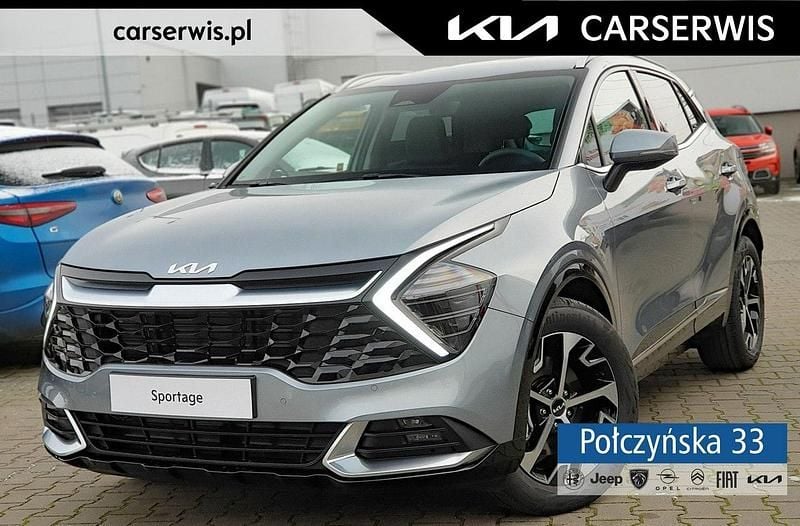 Srebrny (metalik) Używany 2024 Kia Sportage 2 SUV | 145 980 zł (Uczciwa cena) - Obraz 1/4