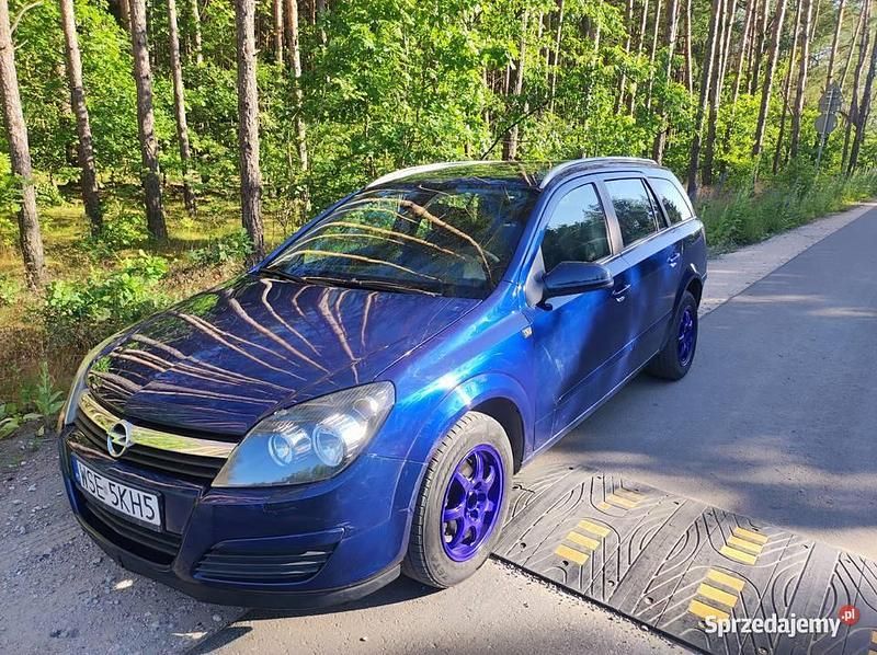 Granatowy Używany 2005 Opel Astra Kombi | 7300 zł (Uczciwa cena) - Obraz 1/4
