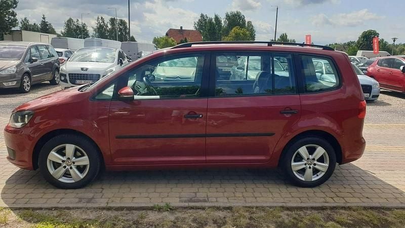 Używany VW Touran 105 KM (77 kW) 2010 Bordowy (metalik) Minivan