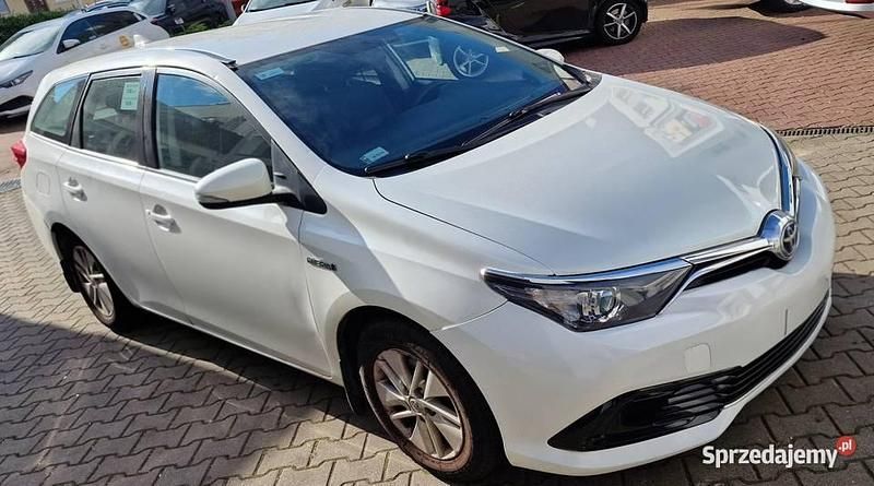 Biały Używany 2018 Toyota Auris Hybrid Kombi | 37 000 zł (Uczciwa cena) - Obraz 1/4