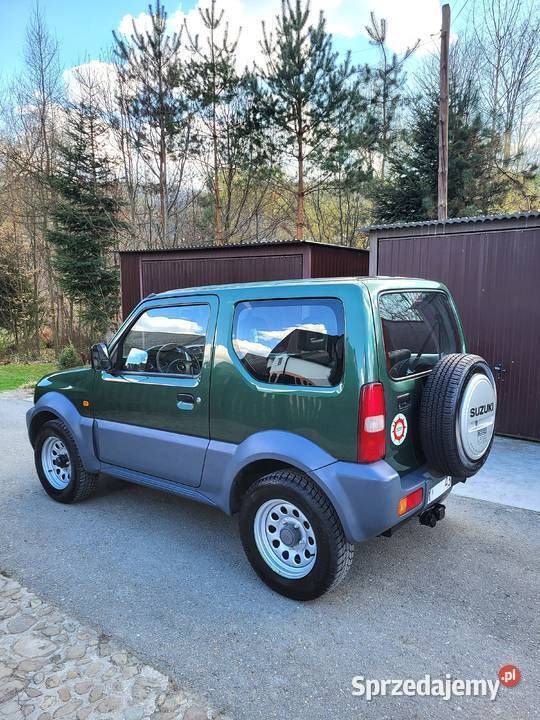 Zielony Używany 2012 Suzuki Jimny Club SUV | 43 000 zł (Uczciwa cena) - Obraz 1/4