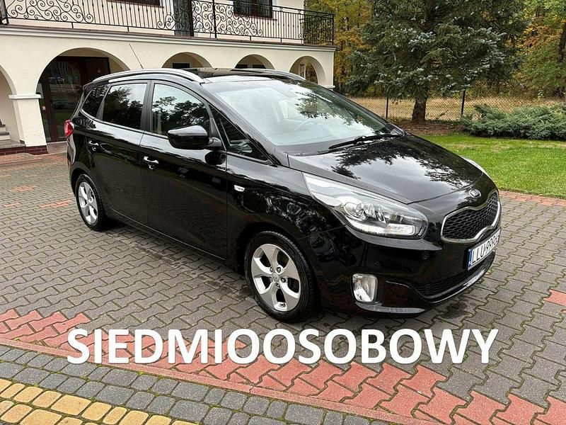 Czarny Używany 2013 Kia Carens Minivan | 28 500 zł (Uczciwa cena) - Obraz 1/4