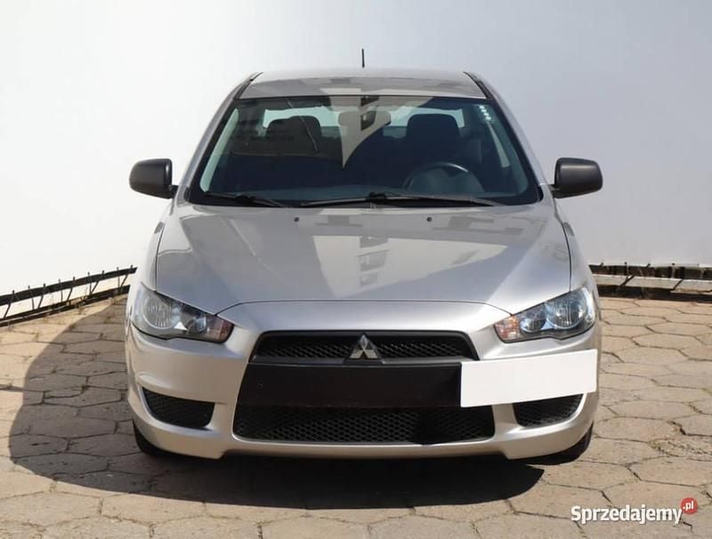 Srebrny Używany 2012 Mitsubishi Lancer Sedan/Limuzyna | 22 999 zł (Uczciwa cena) - Obraz 1/4