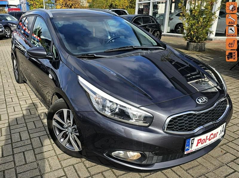 Grafitowy (metalik) Używany 2013 Kia Ceed 2 Kombi | 25 900 zł (Uczciwa cena) - Obraz 1/4
