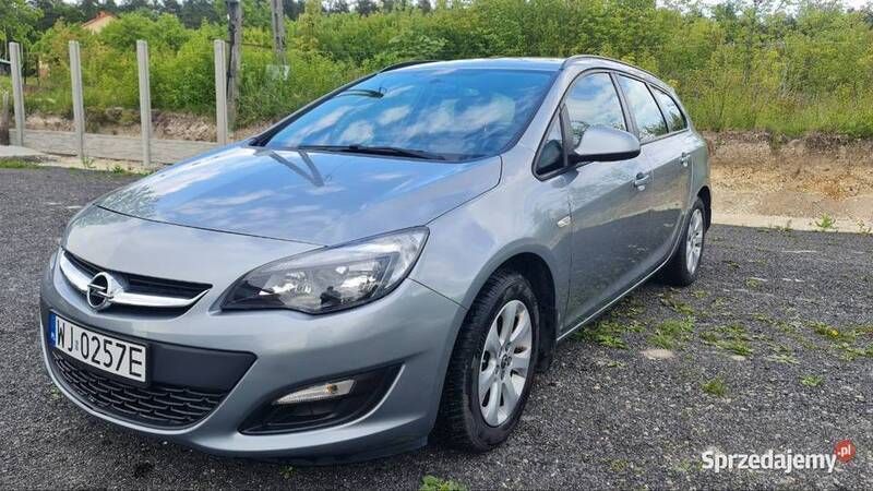 Srebrny Używany 2015 Opel Astra Kombi | 32 700 zł (Dość drogi) - Obraz 1/4