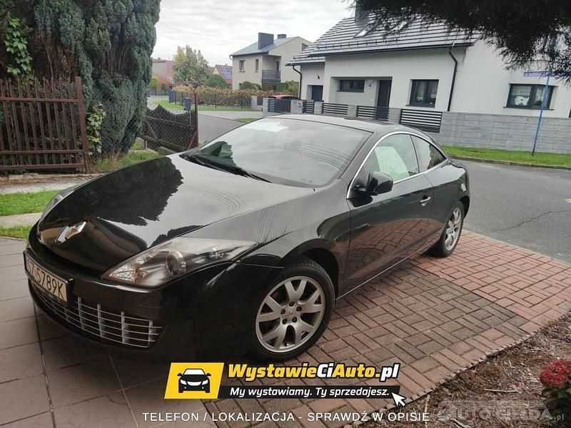 Czarny Używany 2011 Renault Laguna III Hatchback | 24 000 zł - Obraz 1/4