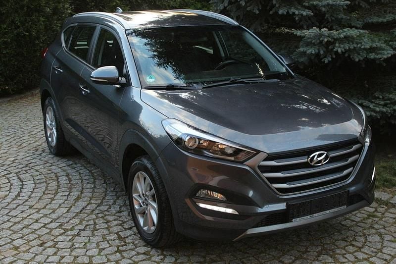 Szary Używany 2015 Hyundai Tucson SUV | 58 900 zł (Uczciwa cena) - Obraz 1/4