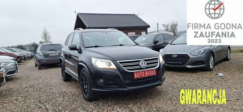 Czarny (metalik) Używany 2009 VW Tiguan R-line SUV | 34 900 zł (Uczciwa cena) - Obraz 1/4