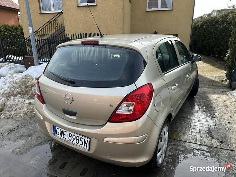 Używany Opel Corsa 80 KM (58 kW) 2008 Brązowy (metalik) Hatchback