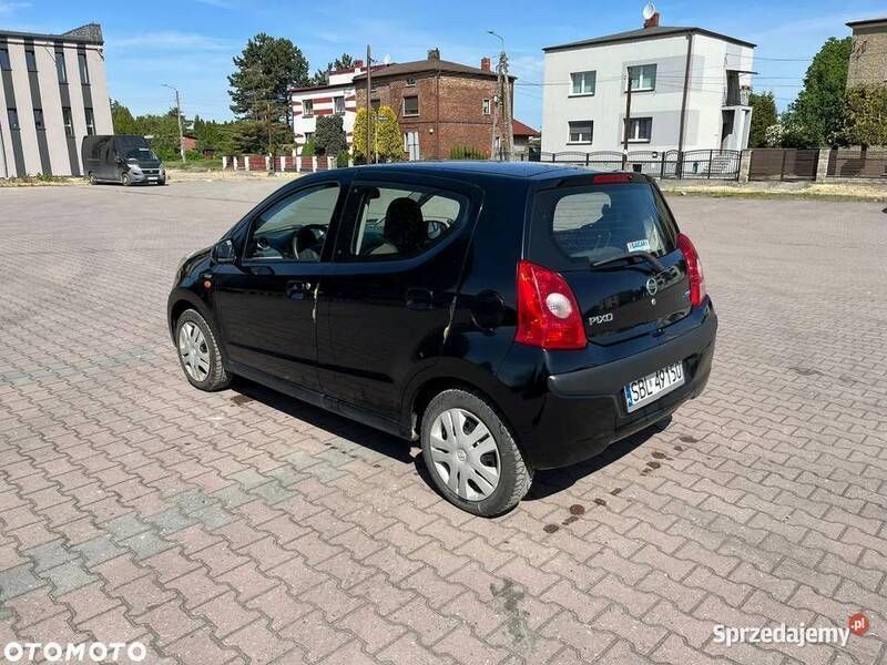 Używany Nissan Pixo 68 KM (50 kW) 2009 Czarny Hatchback