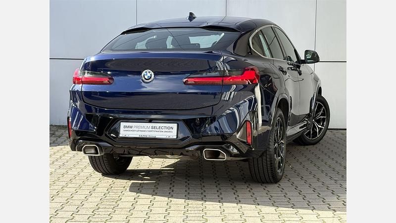 Używany BMW X4 190 KM (139 kW) 2024 Niebieski tanzanite bmw individual metalizowany SUV