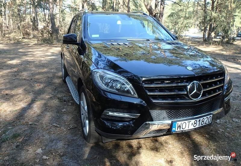 Czarny Używany 2012 Mercedes ML55 AMG AMG SUV | 76 000 zł - Obraz 1/4