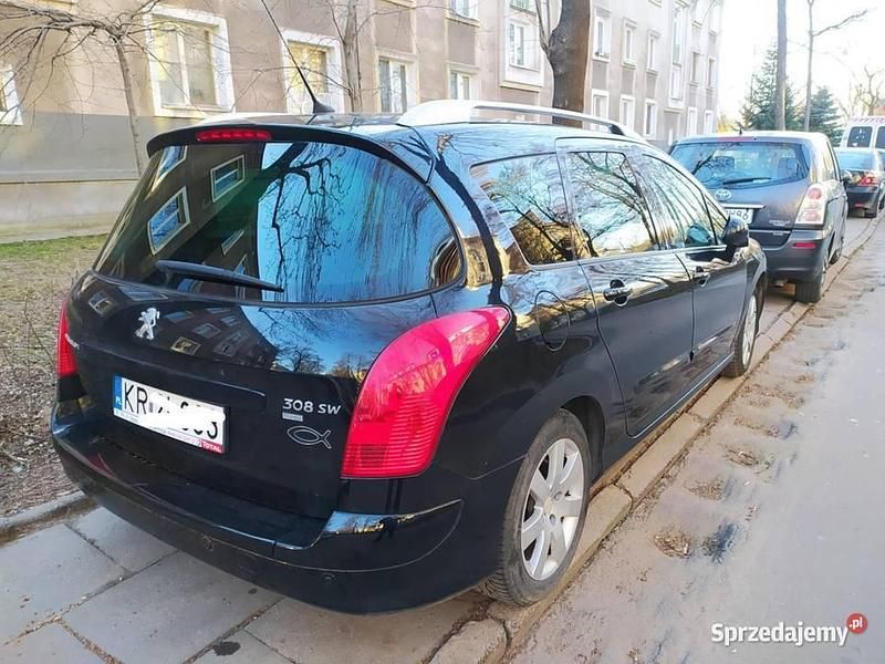 Czarny Używany 2012 Peugeot 308 SW Kombi | 22 500 zł (Uczciwa cena) - Obraz 1/4
