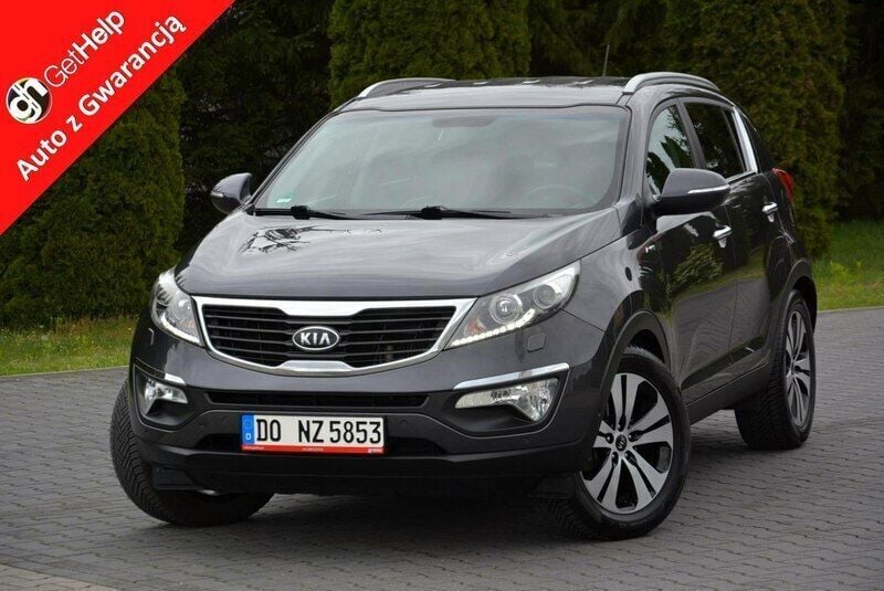 Szary Używany 2012 Kia Sportage 2 SUV | 42 900 zł (Uczciwa cena) - Obraz 1/4