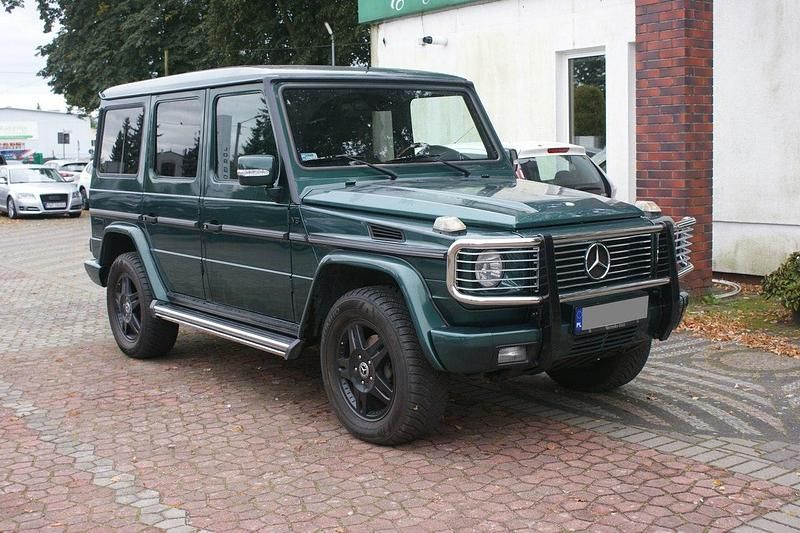 Zielony ciemny (metalik) Używany 2001 Mercedes G400 SUV | 114 900 zł - Obraz 1/4