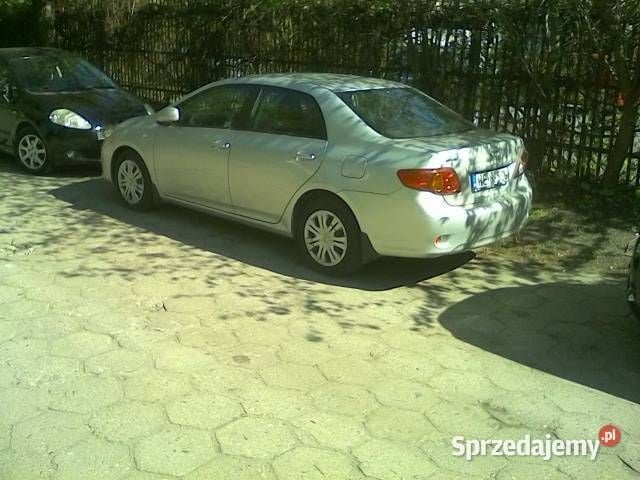 Srebrny Używany 2009 Toyota Corolla Luna Sedan/Limuzyna | 24 000 zł (Uczciwa cena) - Obraz 1/4