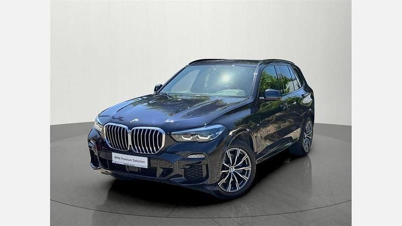 Czarny carbon m metalizowany Używany 2021 BMW X5 Shadowline SUV | 219 900 zł (Dobra cena) - Obraz 1/3
