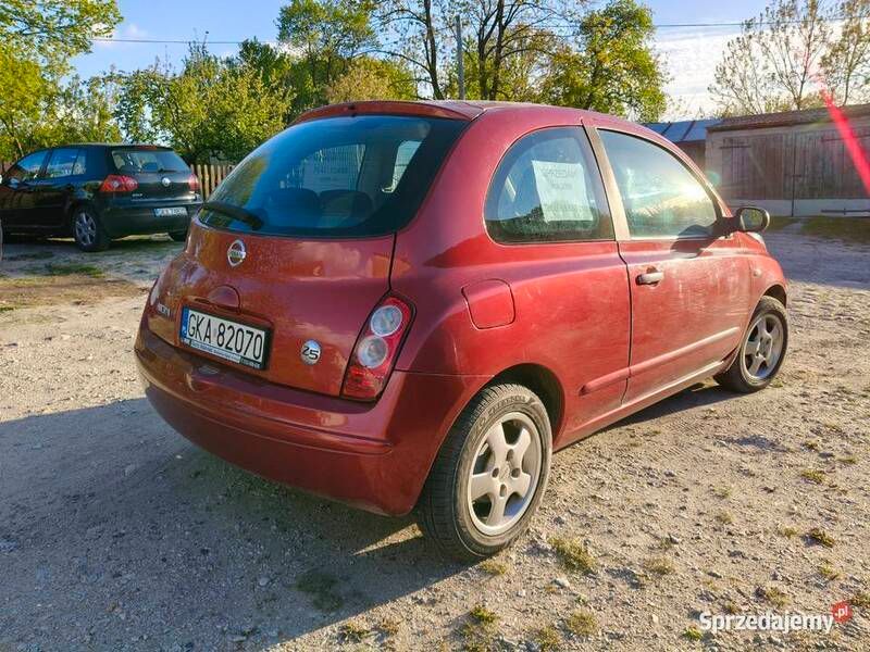 Czerwony Używany 2009 Nissan Micra Hatchback | 7000 zł (Uczciwa cena) - Obraz 1/4