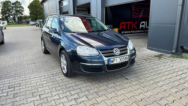 Niebieski ciemny (metalik) Używany 2009 VW Golf VI Kombi | 12 500 zł (Uczciwa cena) - Obraz 1/4