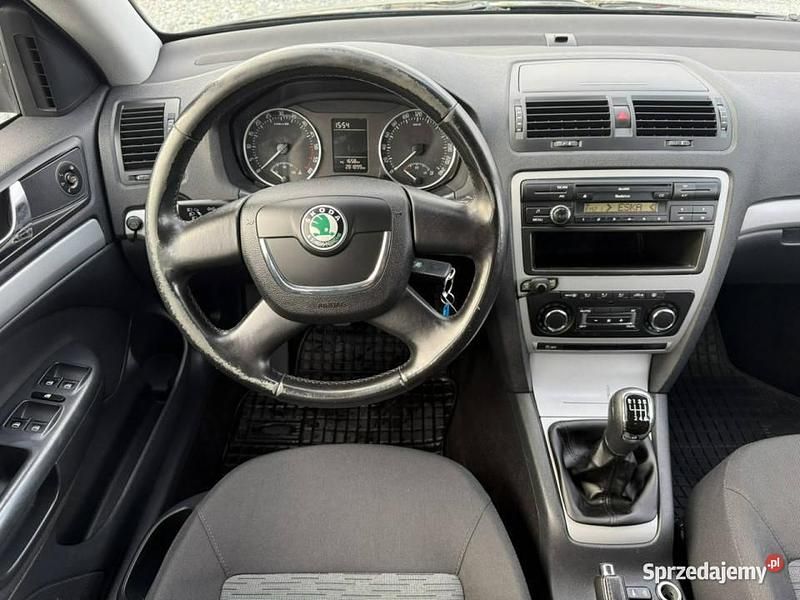 Używany Skoda Octavia 110 KM (80 kW) 2013 Czarny Kombi