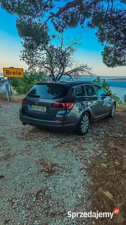 Szary Używany 2011 Opel Astra Kombi | 21 900 zł (Dość drogi) - Obraz 1/4