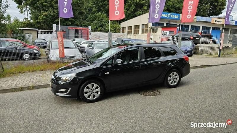 Czarny Używany 2013 Opel Astra Kombi | 16 500 zł (Uczciwa cena) - Obraz 1/4