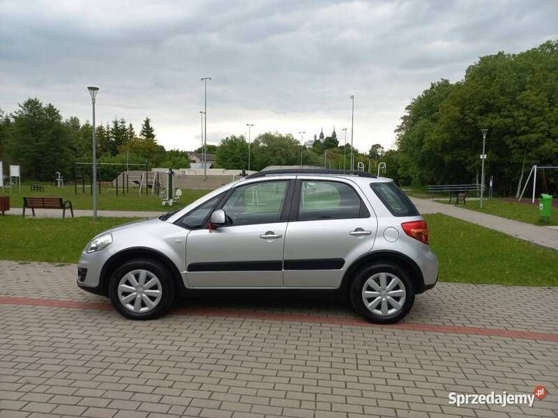 Srebrny Używany 2014 Suzuki SX4 Sedan/Limuzyna | 27 900 zł (Uczciwa cena) - Obraz 1/4