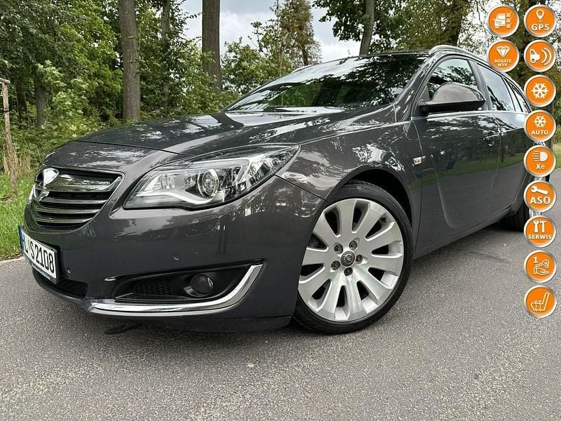 Szary (metalik, perła) Używany 2014 Opel Insignia Cosmo Kombi | 29 900 zł (Uczciwa cena) - Obraz 1/4