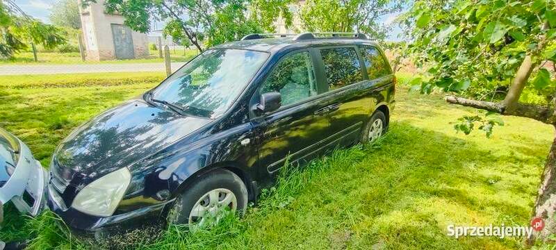 Czarny Używany 2008 Kia Carnival 2 Minivan | 4900 zł - Obraz 1/4